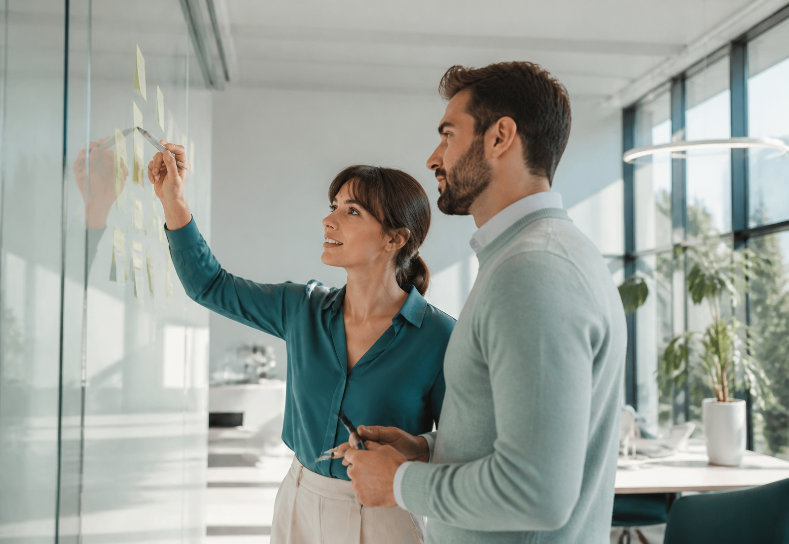 Consultant presenting workforce strategy in a modern office